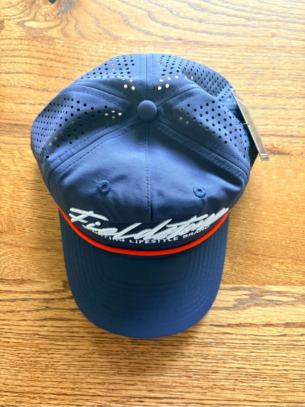 New with tags Fieldstone Navy hat with Red Accent - mens- SnapBack